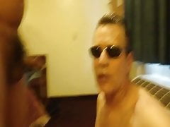 Cumming on guy's face in motel room, two views