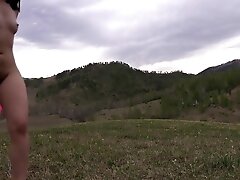 Nudist With A Big Ass And Hairy Pussy Runs Outdoors. Exhibitionism