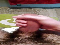 Jerking off hairy cock to climax