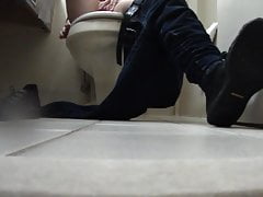 Waitress masturbation shoeplay in bathroom
