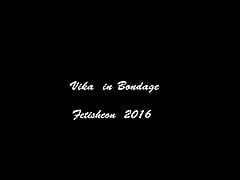 Nude blindfold slave struggles on bed