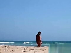 HUSBAND SHARE WIFE AT THE BEACH