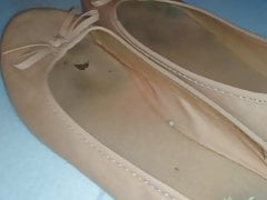 Cum on her orange well worn ballerinas