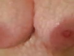 HOT wife pressing her big tits against glass