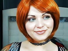 Woman licking her lips moist tongue and looks